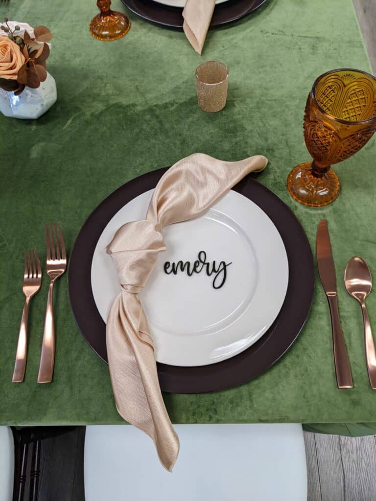 Moss green Velvet linens with chocolate chargers